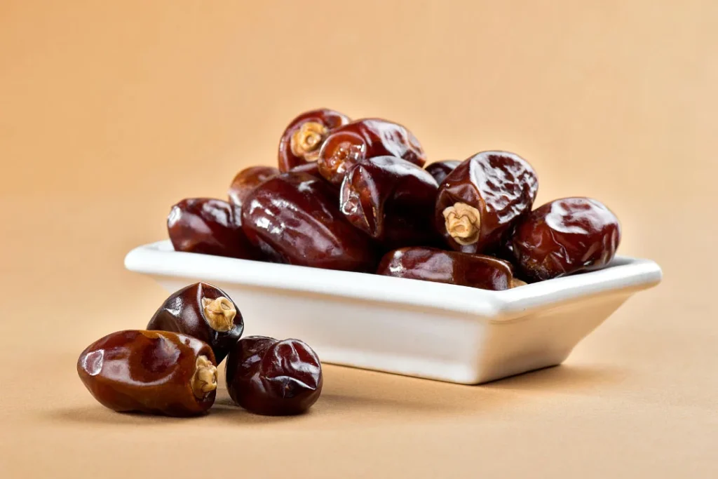 Fresh dates placed in a tray. 