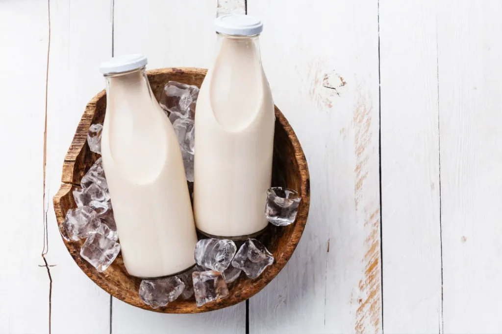 Two bottles containing milk.