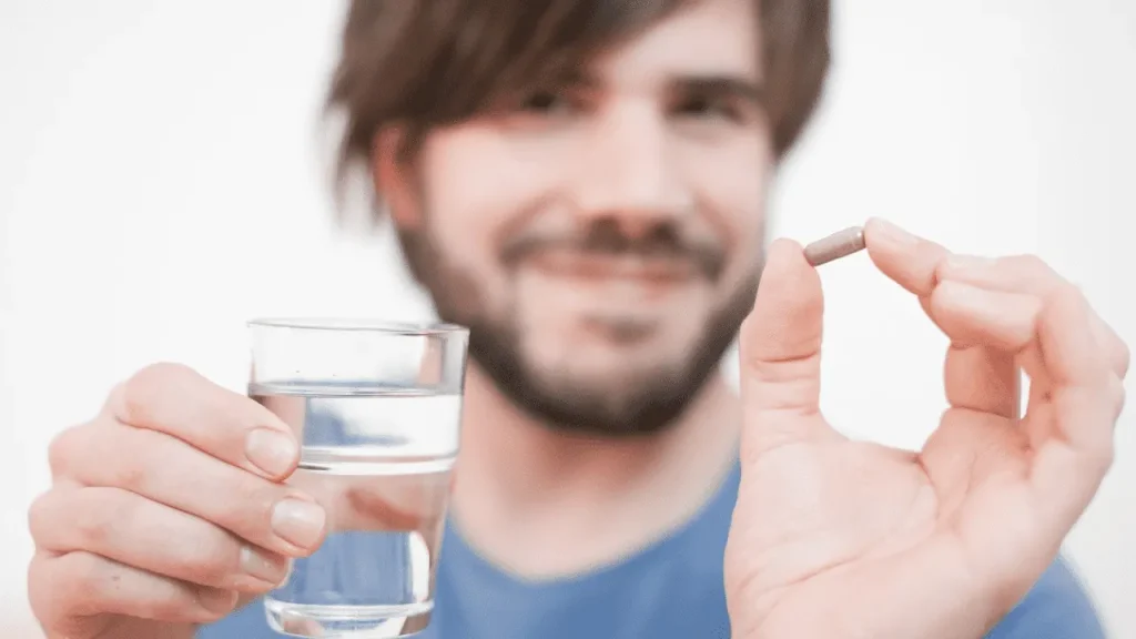 Man having supplement.